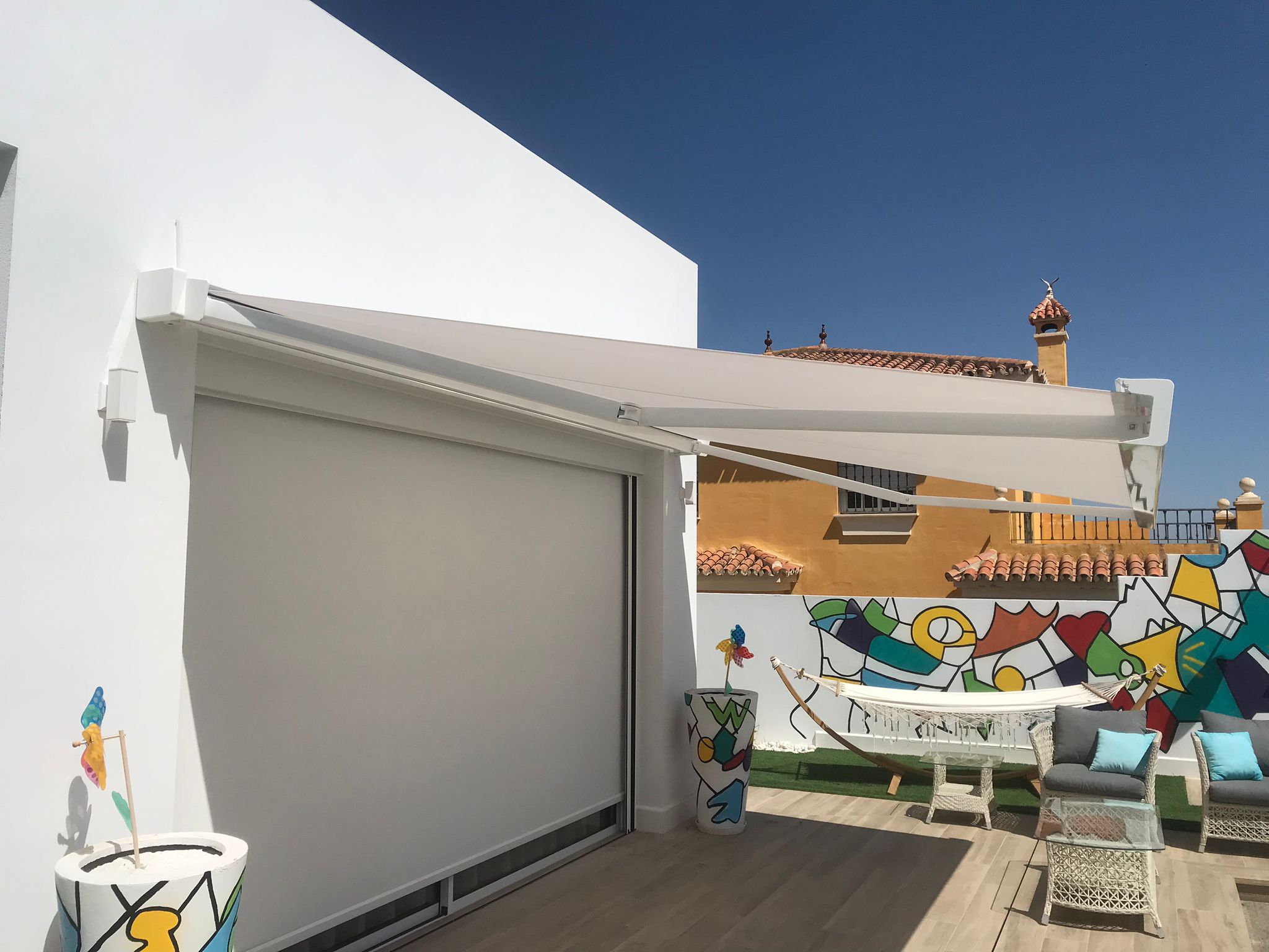 Toldo cofre Aland Gaviota blanco extendido